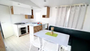 Locatif - 25m² mobil home,  covered terrace, TRIGANO MERMAID MODEL, television, 2 bedrooms - Camping Les Rives de l'Ardèche