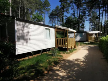 Mietunterkunft - Hirondelle - Clim + Tv Mobilheim 28 M ²+ Tv - Camping Ushuaïa Villages les Pins d'Ucel