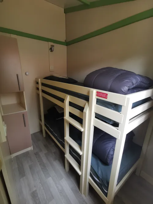 Huuraccommodatie(s) - Genet - Clim + Tv Chalet 21.5M² + Tv - image n°6 - Ushuaïa Villages - Camping Les Pins d'Ucel ****