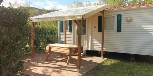 Mietunterkunft - Mh 4 Pers. Le Rétro + Terrasse - image n°1 - Camping LE CARPENTY