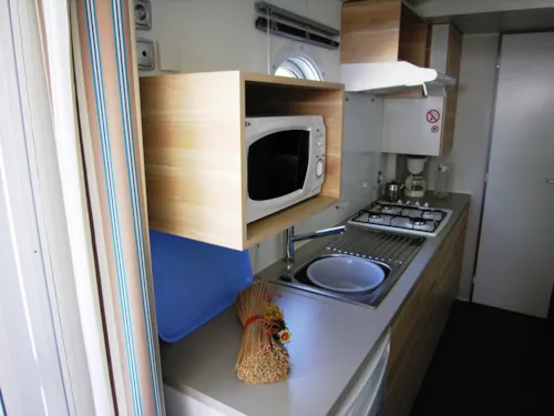 Mietunterkunft - Mobil Home O'hara - 29M²- 2 Schlafzimmer + Tv + Klimaanlage - image n°6 - Camping de la Plage