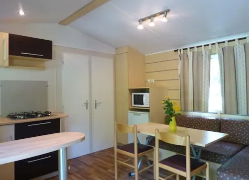 Location - Mobil Home 2 Chambres - image n°7 - Camping Les Acacias