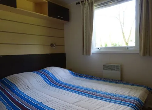 Location - Mobil Home 2 Chambres - image n°4 - Camping Les Acacias