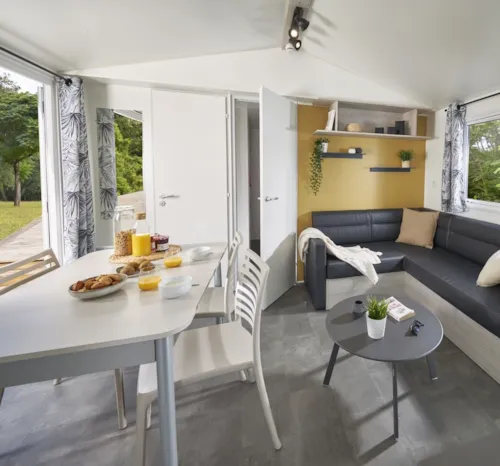 Location - Mobil Home Ib Trigano Evo 29 2 Chambres Clim Et Télévision - image n°2 - Camping Le Sous-Bois Ardèche