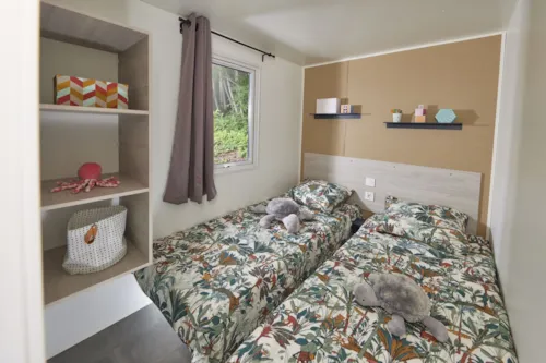 Location - Mobil Home Ib Trigano Evo 29 2 Chambres Clim Et Télévision - image n°7 - Camping Le Sous-Bois Ardèche