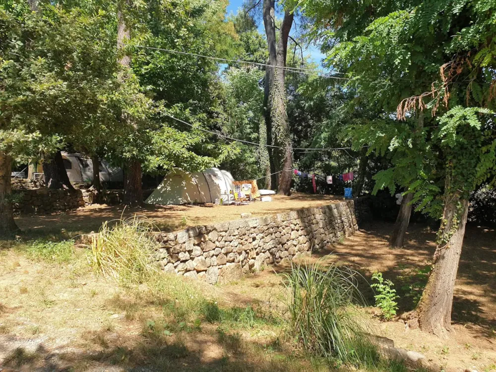 Pitch - Premium Tent Location - CAMPING LES CRUSES