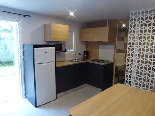 Mietunterkunft - Mobilheim 3 Zimmer 35M², Gepflasterte Terrasse - image n°3 - Domaine la Garenne