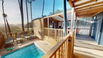 Mietunterkunft - Chalet Premium - Piscine 6/7P - Camping Le Vieux Port Resort & Spa
