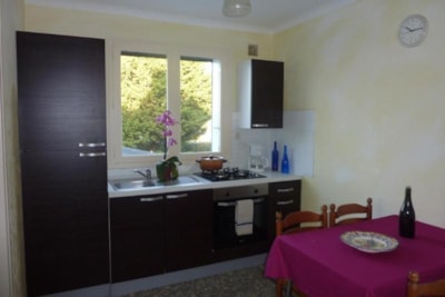 T3 (2 bedrooms, kitchen, living room with TV, balcony) — 3