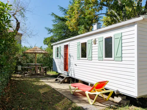 Location - Mobil-Home 24M² Standard (2Ch - 4Pers.) + Paillote Extérieure - image n°2 - Camping Les Paillotes en Ardèche