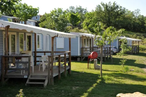 Mietunterkunft - Mobilheim 2 Zimmer Riviera  27,5M² +Klimaanlage - image n°4 - Camping Chadeyron