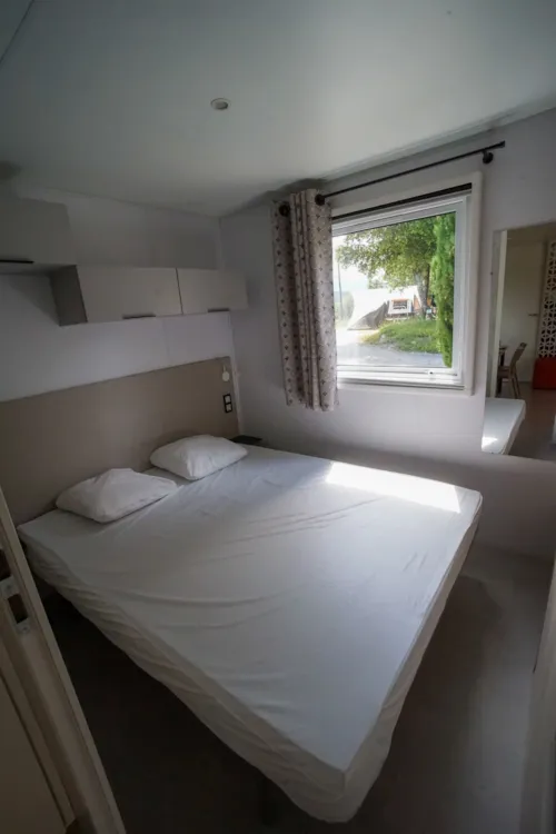 Mietunterkunft - Klimatisiertes Mobilheim Louisiane 2023 - 3 Schlafzimmer - 6 Personen - image n°6 - Camping Chadeyron