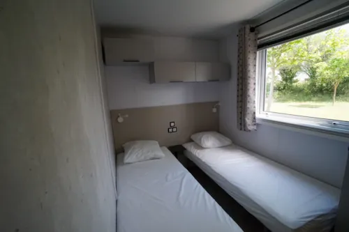 Mietunterkunft - Klimatisiertes Mobilheim Louisiane 2023 - 3 Schlafzimmer - 6 Personen - image n°5 - Camping Chadeyron