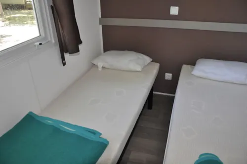 Location - Mobil-Home Confort Climatiser - image n°3 - Camping Les Rives d'Auzon