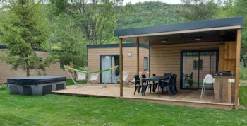 Mietunterkunft - Cottage Exclusive: 3 Schlafzimmer, 2 Badezimmer, 2 Wcs, Küche, Elektrogrill, Private Spa - Camping Les Rives du Lac