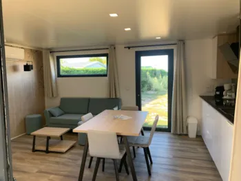 Mietunterkunft - C- Mobil-Home Méditerranée Confort Climatisé 2 Chambres 1/4 Pers. - Chadotel La Trévillière
