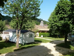Camping Les Jardins de l'Abbaye - image n°2 - Roulottes