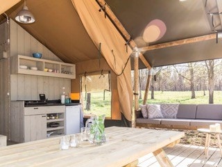 NEW 2023 Lodge Safari: a glamping-style tent with bathroom facilities and a large terrace