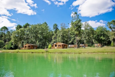 Cabin in front of the pond