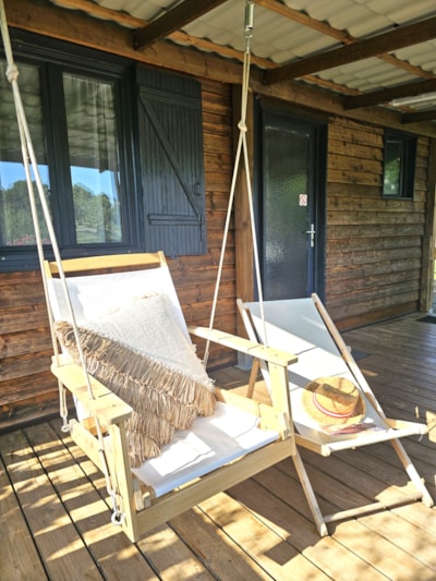 Cabin in front of the pond