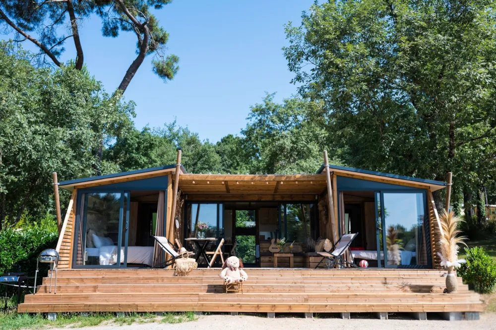 Location - Chalet Premium 2 Chambres 2 Salles De Bains Face A L'etang - Gaia Ecolodge