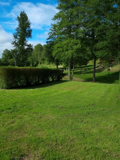 Landscaped natural pitch - 1 vehicle (car, camper van, or motorcycle) - 10A electricity — 3