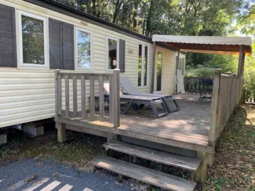 Accommodation - Mobil-Home Cottage-Gold : 1 Suite + 1 Chambre - Cheminée - Tv   - Grand Réfrigérateur - Terrasse - Camping Le Pontillou