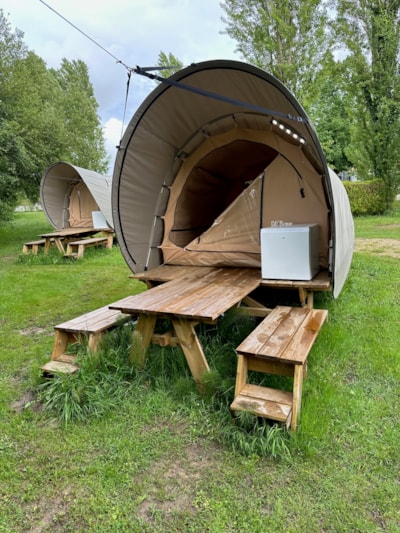UNUSUAL: Tent on stilts + built-in table and 2 benches + top-mounted refrigerator