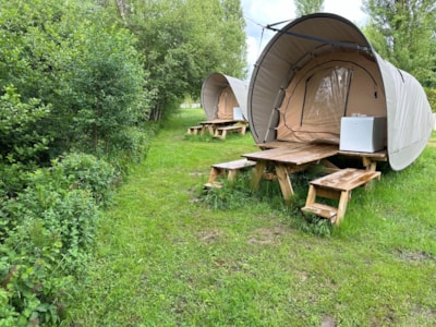 UNUSUAL: Tent on stilts + built-in table and 2 benches + top-mounted refrigerator