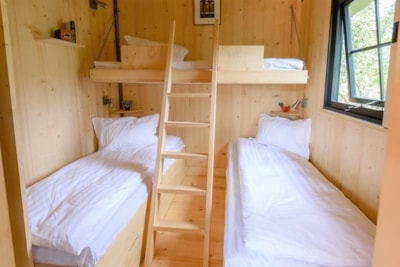 Wooden cabin on stilts “L'Encantada”