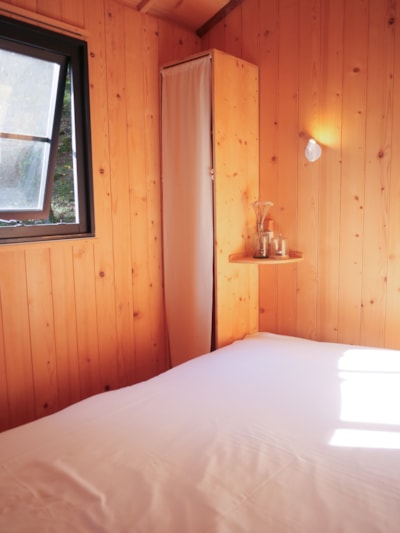 Wooden cabin on stilts “L'Encantada”