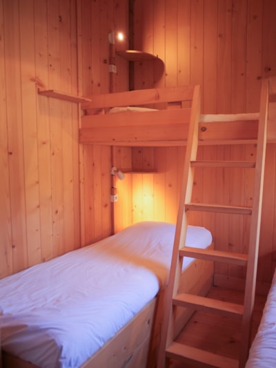 Wooden cabin on stilts “L'Encantada”