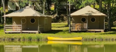 40m² fully-equipped Lodge tent - no sanitary facilities - on the edge of the fishing pond