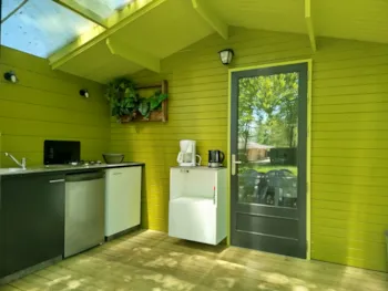 Mietunterkunft - Bungalow Bananier - Le Domaine du CASTEX - Camping & Hébergement