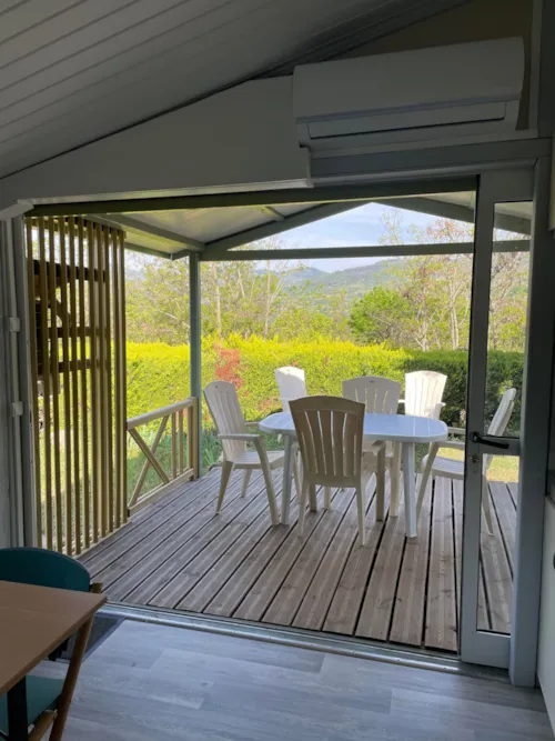 Accommodation - Chalet Cornas -32M²- 2 Bedrooms, 6 Single Beds With Reversible Air Conditioning - image n°3 - Domaine Camping  Les Roches