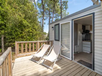 Mietunterkunft - Confort 2 Zimmer - 30M² - Terrasse - Camping LES GENETS