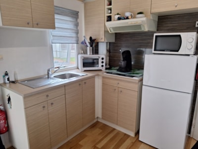 Standard Mobile home 27m² / 2 bedrooms - Half-covered terrace (+ de 8 years) — 2