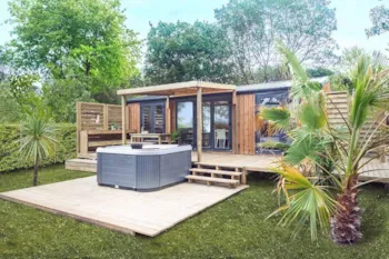 Mietunterkunft - Mobilheim 3 Zimmer+ Jacuzzi New 2018 - Camping Marvilla Parks - La Plage d'Argens
