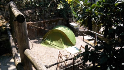 Pitch (small tent) + car in the parking. Terraced campsite. — 2