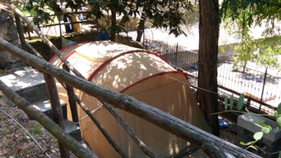 Pitch (middle tent/big tent) + car in the parking. Terraced campsite. — 1