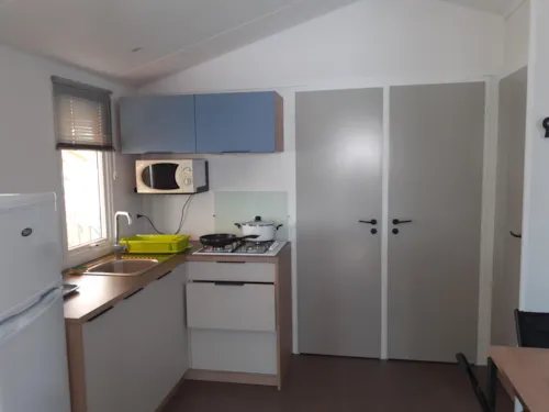 Huuraccommodatie(s) - Stacaravan Bermudes Trio 31 M² - image n°4 - Camping La Renouillère