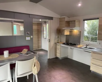Mietunterkunft - Mobilheim Tahiti Barrierefrei 32 M² + Klimaanlage - Camping L'Ile d'Or