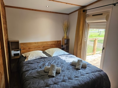 56 m² Premium mobile home (3 bedrooms) with semi-covered terrace + Air conditioning + TV + LV + Plan