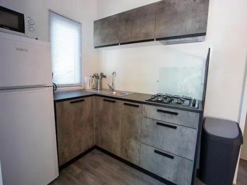 Mietunterkunft - Premium Cottage Chanterelle Duo 2Ch. - Tv - image n°4 - Camping La Marette Sites & Paysages