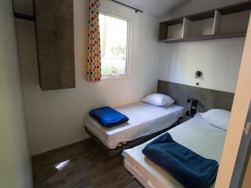 Mietunterkunft - Premium Cottage Chanterelle Duo 2Ch. - Tv - image n°7 - Camping La Marette Sites & Paysages