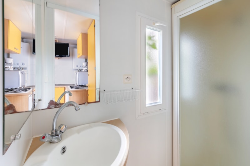 Mobilheim TAMARIS – 20 m² – 1 Schlafzimmer – überdachte Terrasse 10 m²