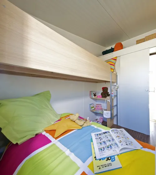 Location - Bungalow Toilé - Sans Sanitaires. 1 Chambre Lit Double, 1 Chambre 3 Couchages (1 Superposé) - image n°4 - Camping Le Colombier