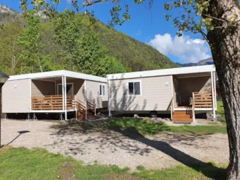 Mietunterkunft - Mobilheim Luxus Aurora 36 Mq + 8 Mq Terrasse - Camping Al Lago