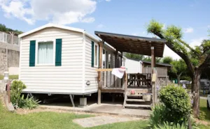 Locatif - Mobil-home 'L'Ardechoise' (28m² avec terrasse) 4 pers et 1 voiture. Climatisation. Animaux non admis - Camping Le Castelet