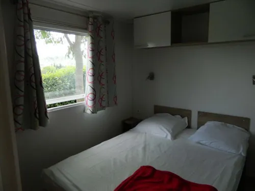Accommodation - Mobile Home Oceane Avec Climatiseur,Terrasse Couverte - image n°4 - CAMPING LES CHATAIGNIERS